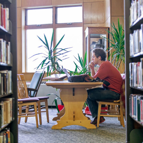 Student in library