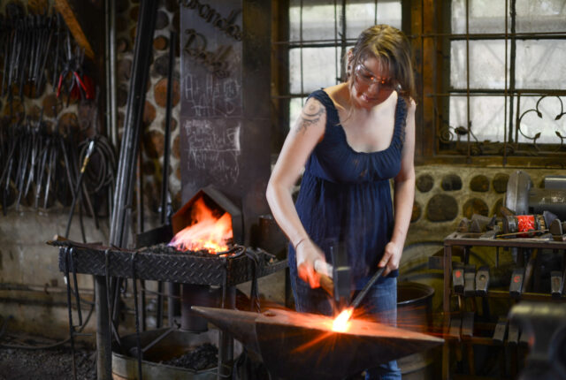 blacksmithing student