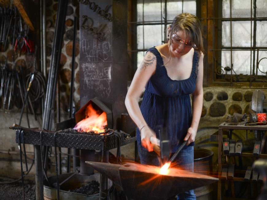 blacksmithing student