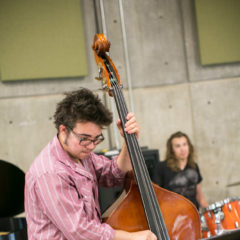 Student playing stand-up bass