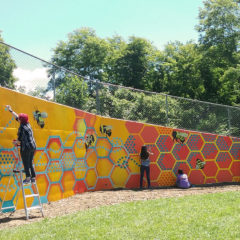 students paint a mural