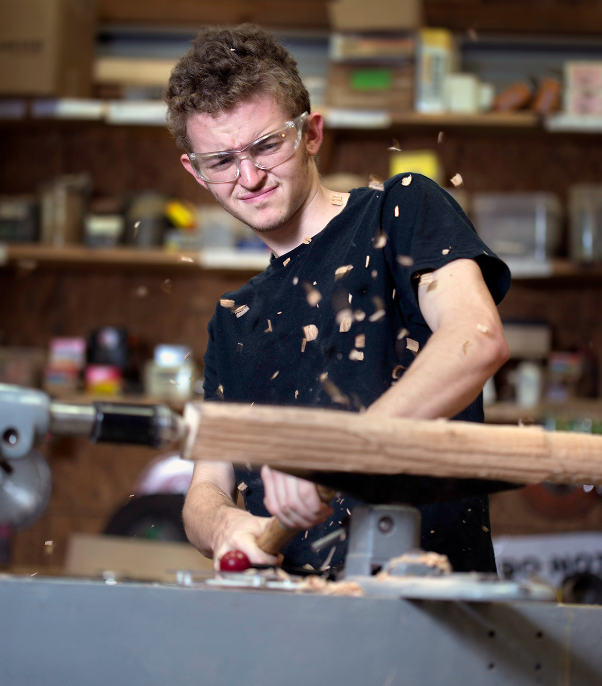 Student using lathe - Work Program - Woodworking - Warren Wilson College