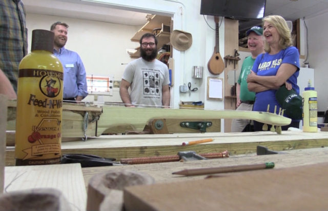 (L-R) Interim Associate Dean of Work Paul Bobbitt, Fine Woodworking Fellow Nick Falduto, board of trustees chairman Bill Christy and President-elect Lynn Morton share a laugh in the Fine Woodworking Shop.