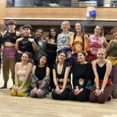Raqs Sharqi (Belly Dance) Workshop hosted by the leaders of the new South West Asian and North Afrikan Alliance. Students Smile for a group picture