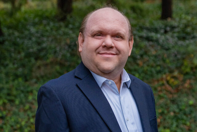 A headshot of Mark Newman