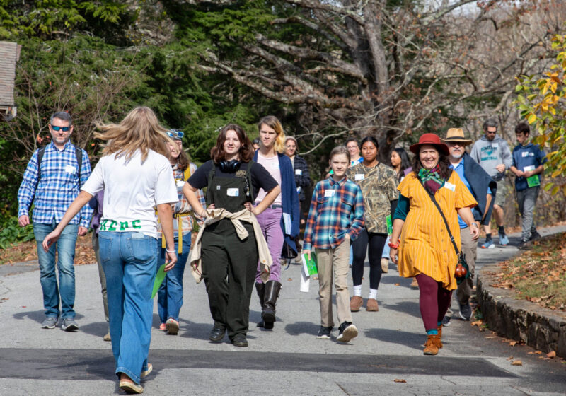 A group of prospective students and their families on a tour of campus on Discovery Day